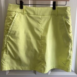 Excellent condition size 4 Puma Neon Yellow Skort. Side zip. Pockets. Chartreuse